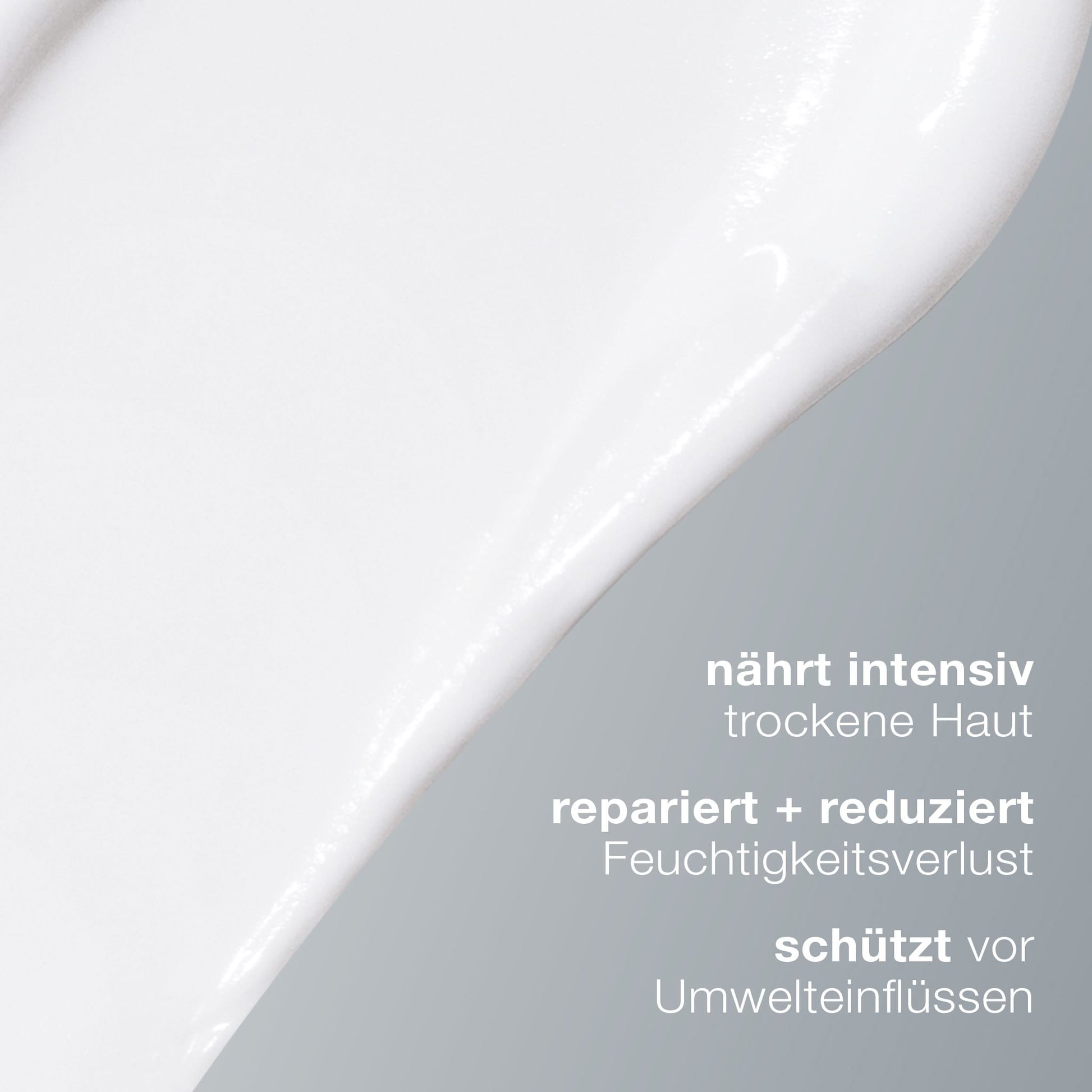 Nahaufnahme einer weißen Cremetextur mit deutschem Text: Super Rich Repair - hochkonzentrierter Moisturizer, nährt trockene Haut, reduziert Feuchtigkeitsverlust und schützt vor Umwelteinflüssen.