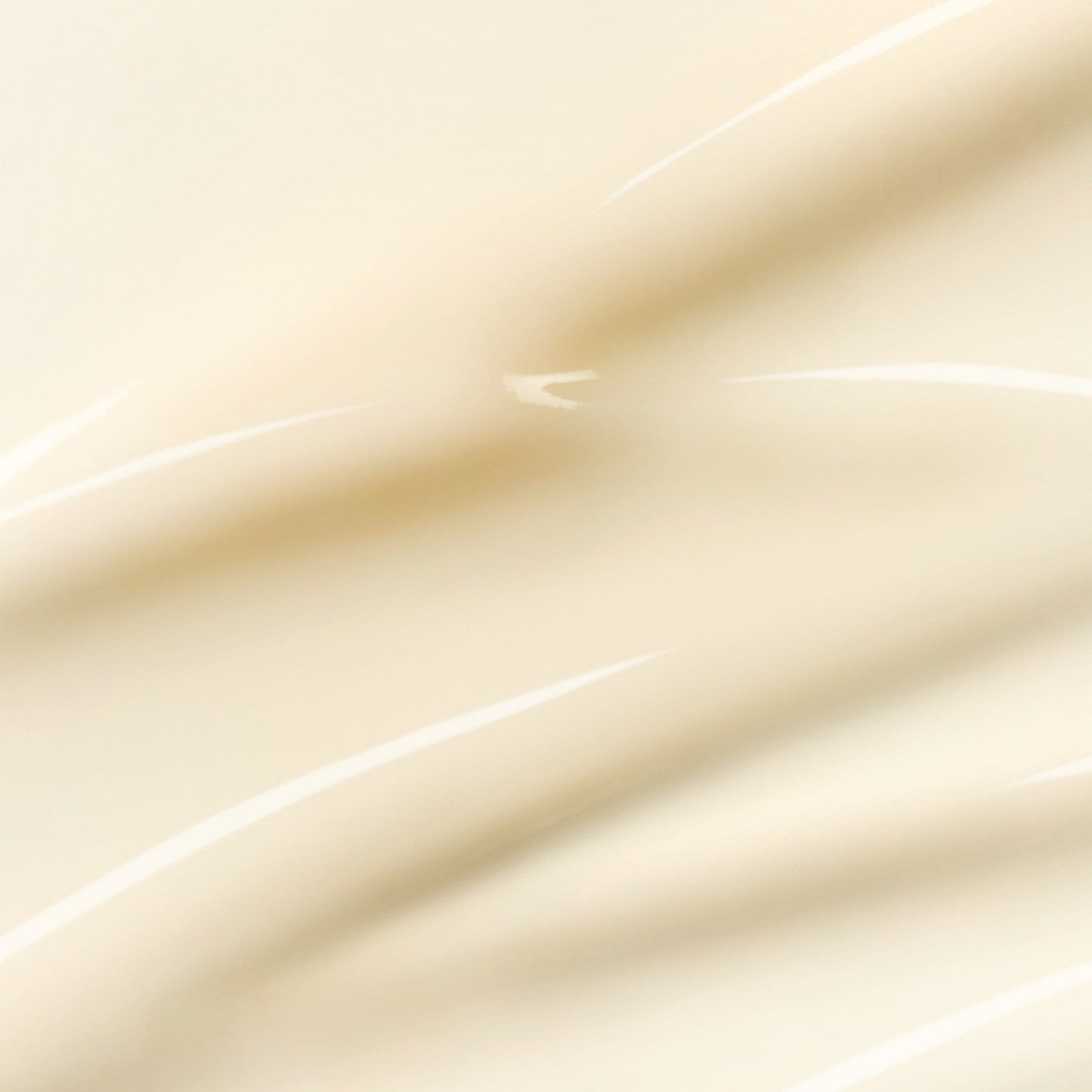 Unscharfes, abstraktes Bild in Creme- und Weißtönen